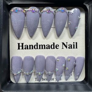 Lavender stiletto cat eye nails